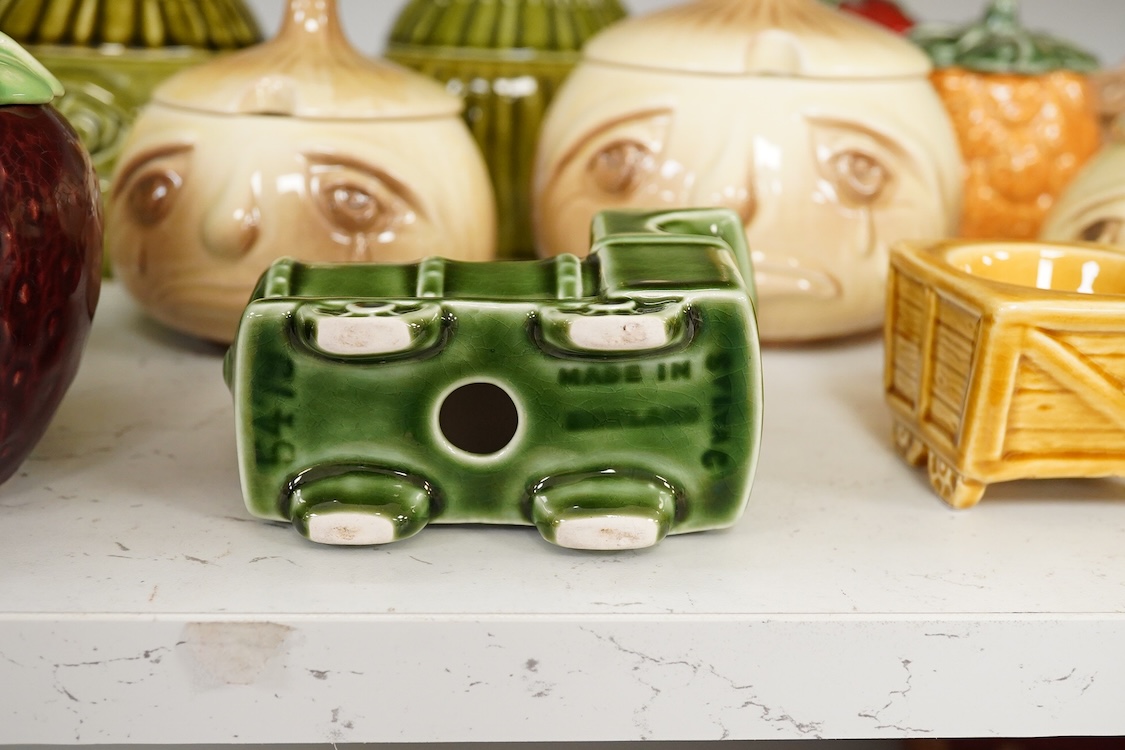 A collection of eighteen Sylvac vegetable pots and table accessories, largest 15cm high